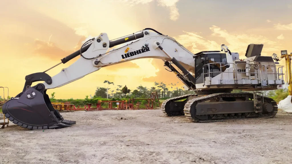 Liebherr зубці та адаптери