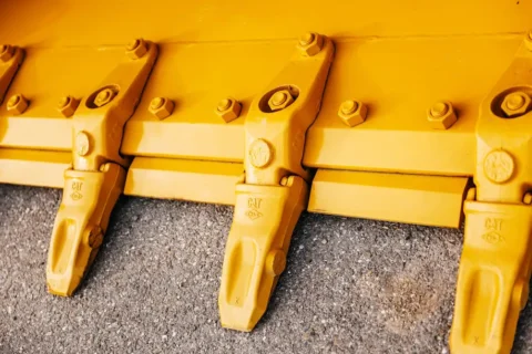 лемеші Caterpillar екскаватори навантажувачі