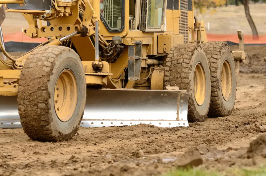дорожні грейдери