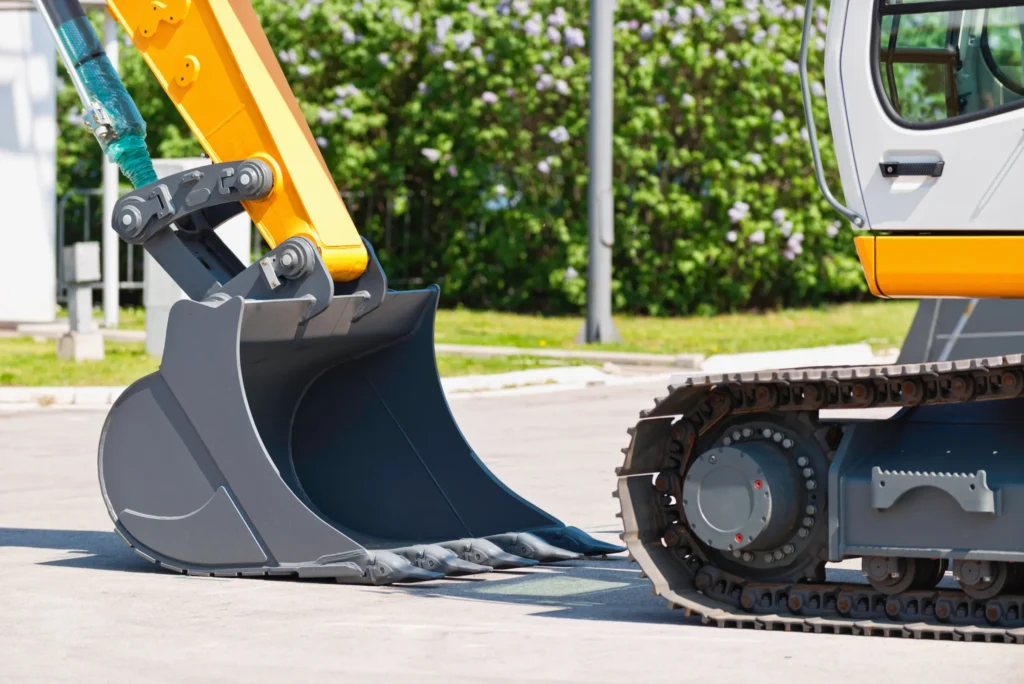 Заміна відвалів для ковшів у будівельних машинах